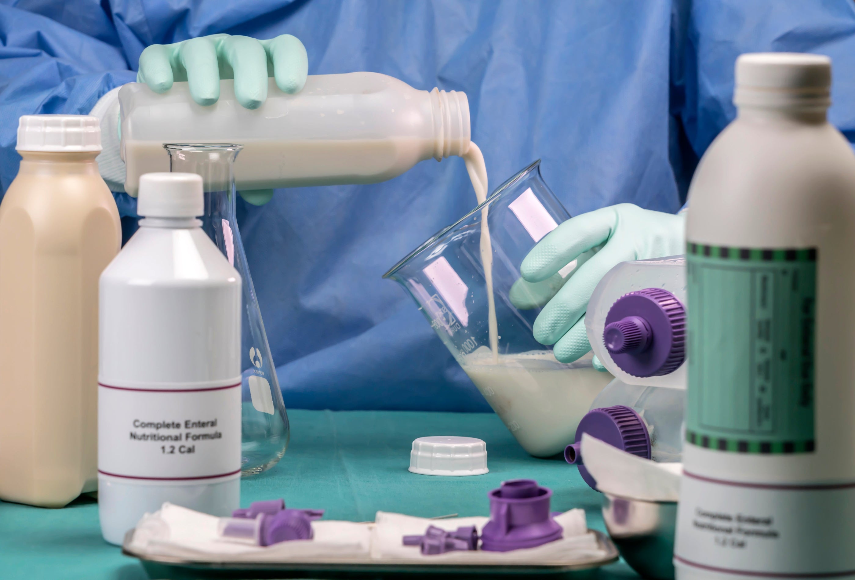 Image of Scientist mixing nutrition formula